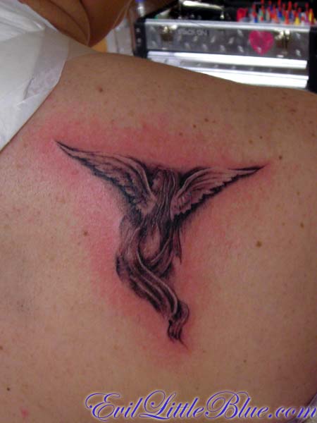 Angel on her shoulder - shoulder tattoo