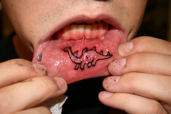 dino lip tattoo by yeahgregtats on deviantART