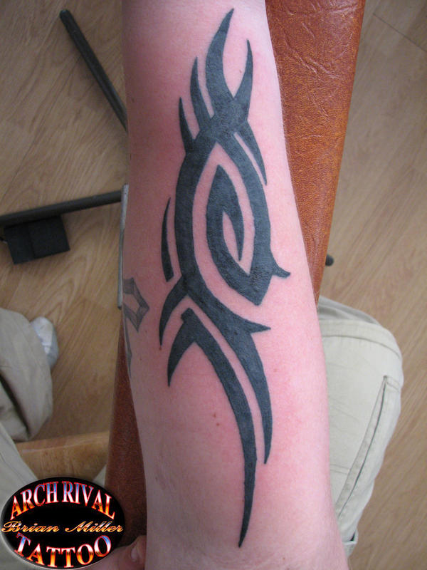 tribal forearm tattoo by