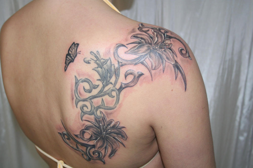 butterfly tattoos on back of shoulder. These characteristics have indeed made flower butterfly tattoos a favored