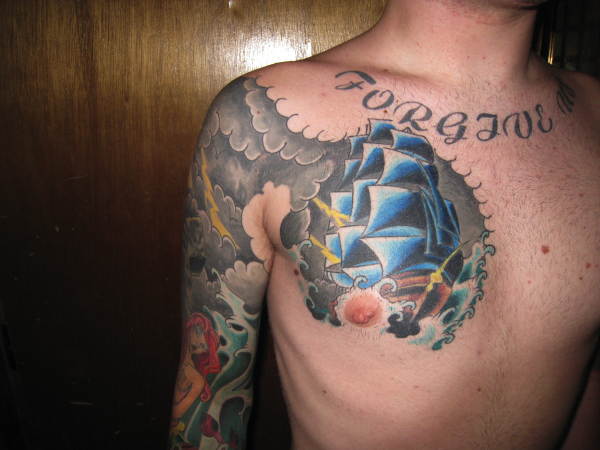 veritas tattoo. chest tattoo by Martin Freeman