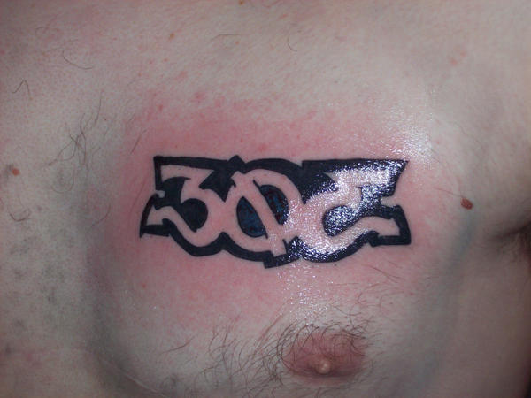 303 stage I - chest tattoo