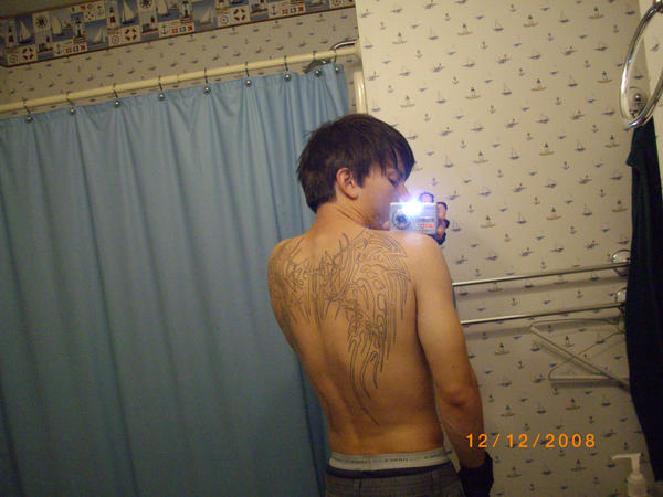 my wings tattoo on my back