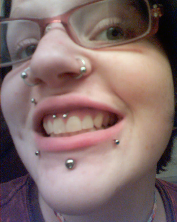 small smiley piercing. smiley piercing by ~toxicgizmo