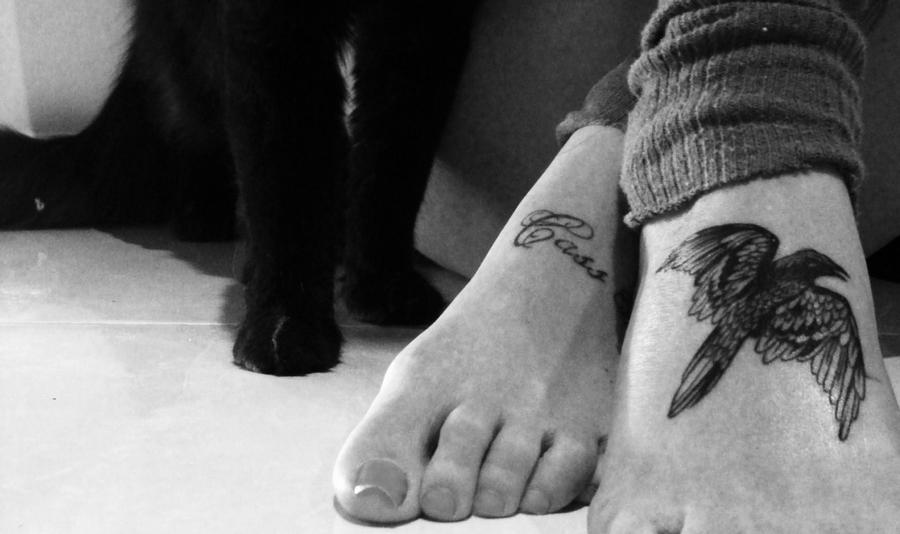 cat feet big feet tattoo