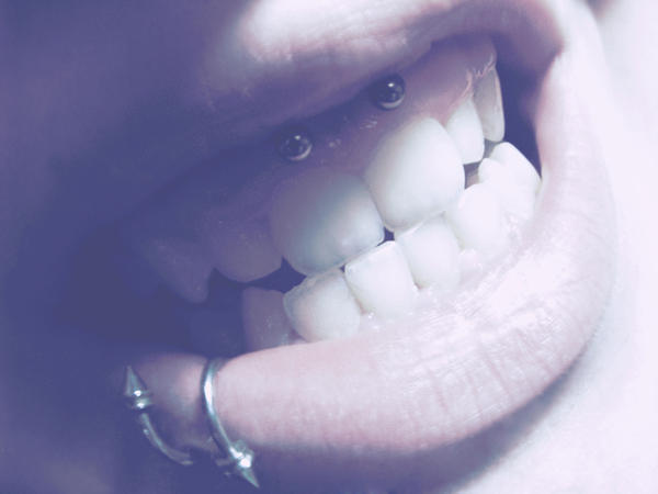 small smiley piercing. smiley piercing. by ~shmor on