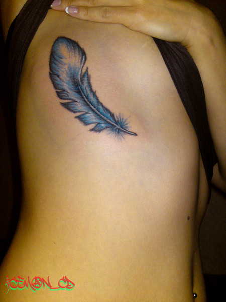 Stylish Feather Tattoo on Arm tattoo feather