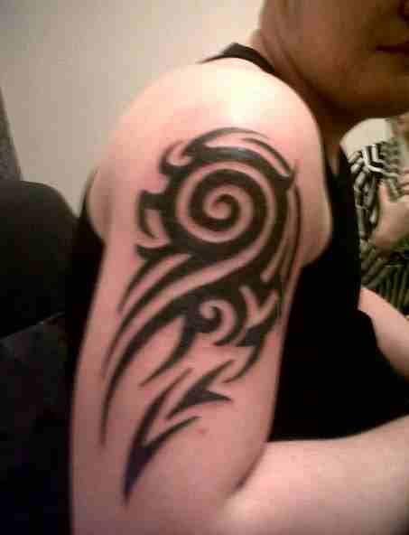 Tribal upper arm tattoos upper