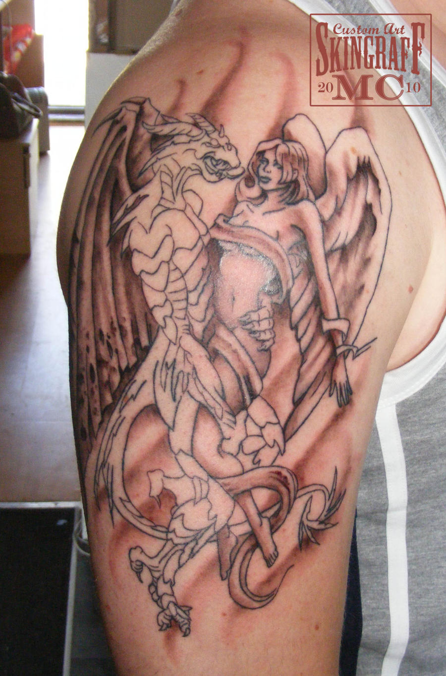Angel and Dragon Tattoo by