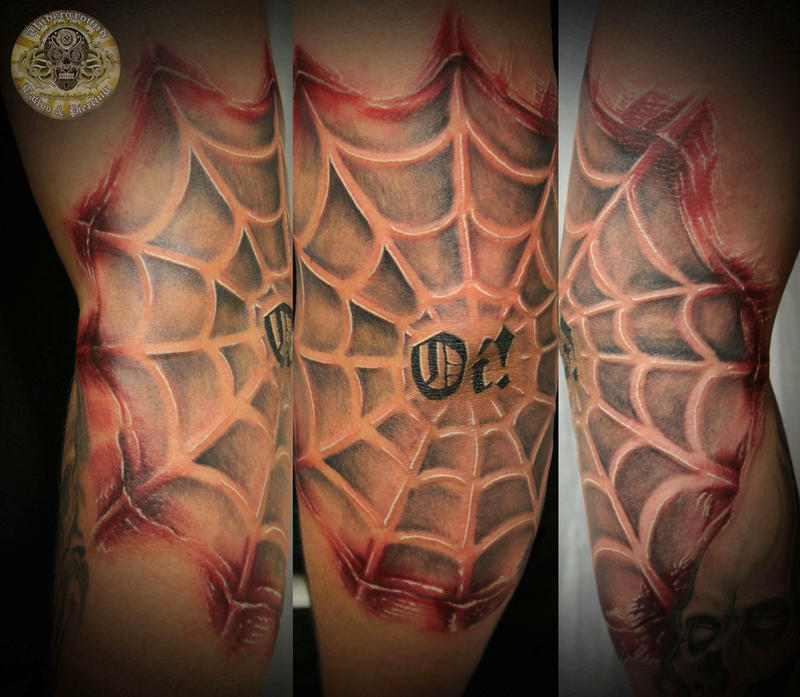 Bloody spider web tattoo by