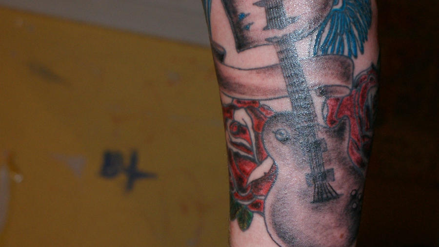 acoustic guitar tattoo