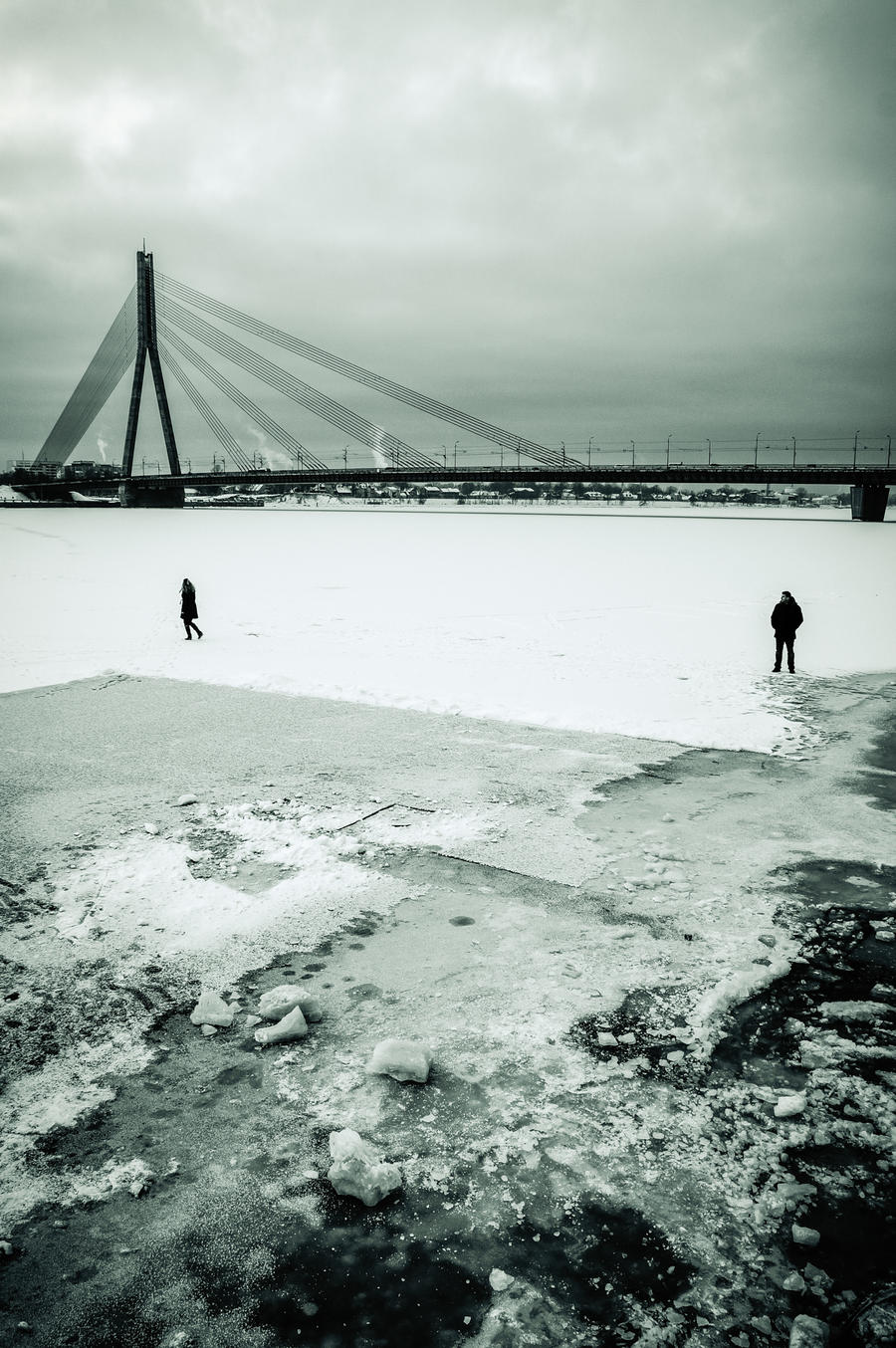 people_walking_on_ice_in_riga__latvia_by