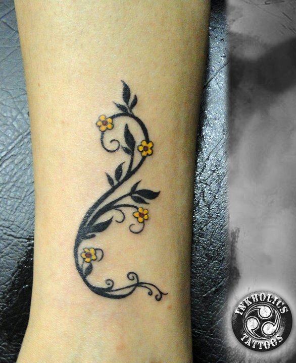 Tattoos For Girls With Flowers. cross tattoos for girls on