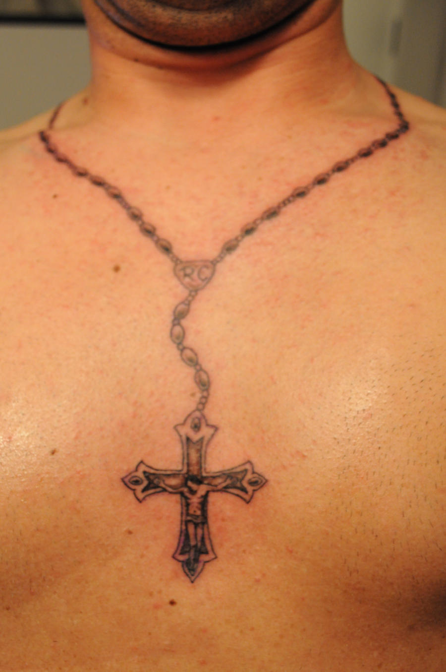 Rosary Tattoo by konZ3pt