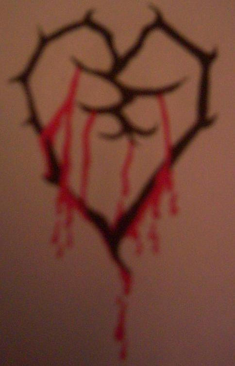 bleeding heart tattoo. Heart Tattoo Designs Bleeding